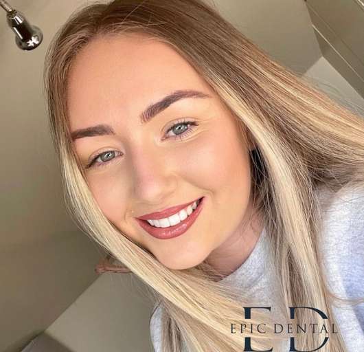 Happy Epic Dental patient
